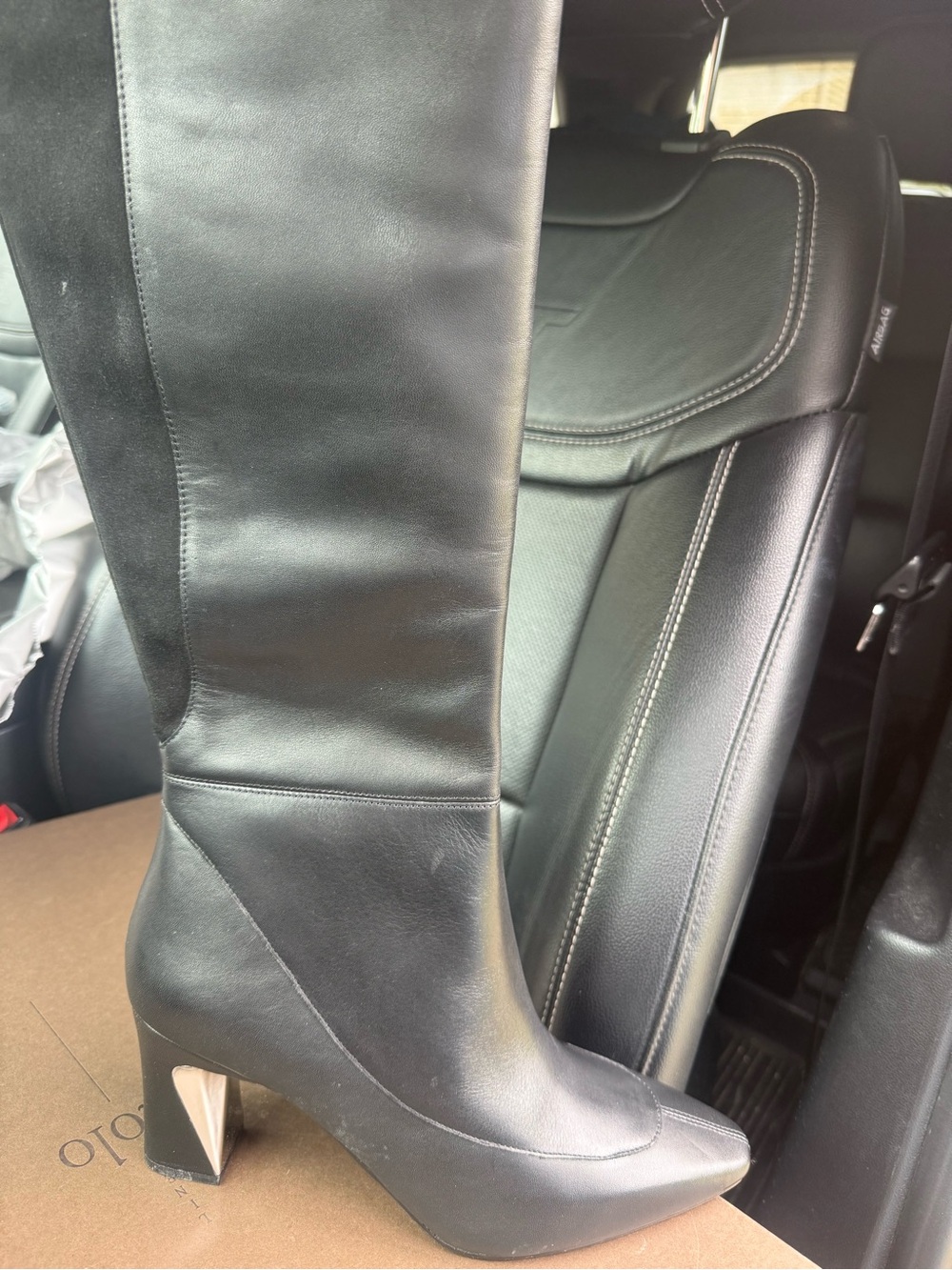 Paolo Black Leather Knee-High Boots with Silver Heel Accent